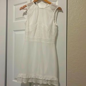 Emily Bazar zip back ruffle hem dress in white